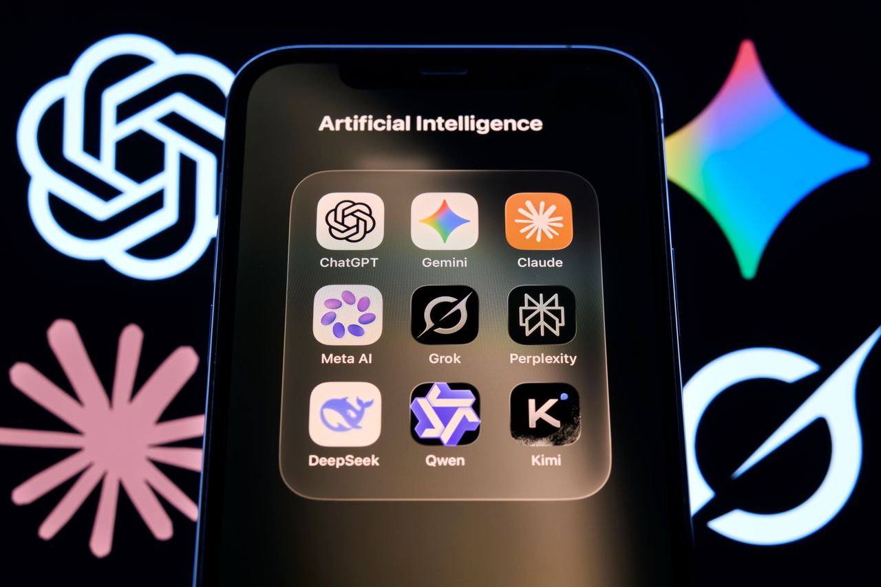 ChatGPT, Gemini, Claude, Meta AI, Grok, Perplexity, DeepSeek, Qwen and Kimi app icons are grouped in an Artificial Intelligence folder on an iPhone home screen. (Photo by Matteo Della Torre/NurPhoto via Getty Images)