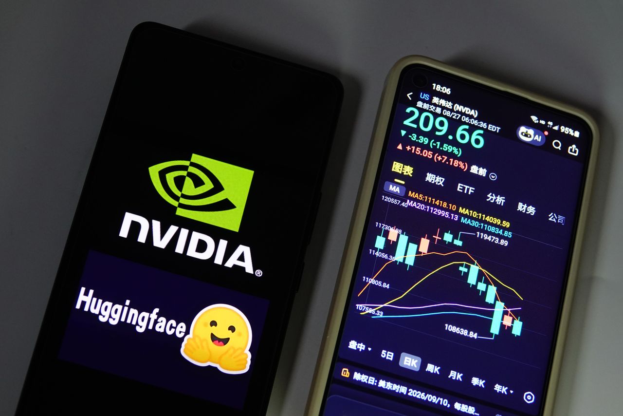 The stock price of NVIDIA displayed on a smartphone with NVIDIA and Hugging Face logo displayed in a smartphone. (Photo credit should read CFOTO/Future Publishing via Getty Images)