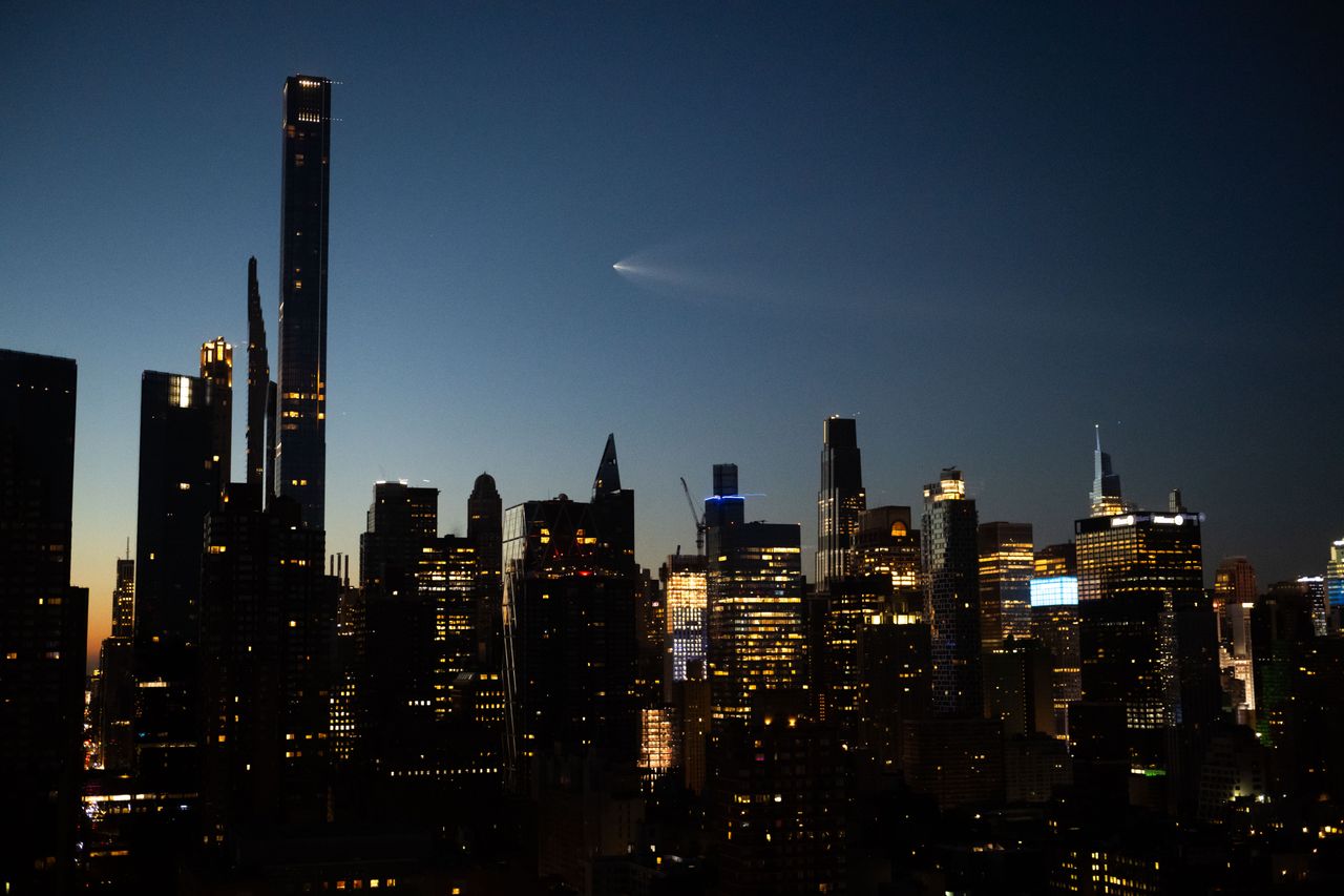 A SpaceX Falcon 9 on mission Starlink Group 10-49 launched from Cape Canaveral creates "Jellyfish" cloud effect as it passes above New York City on August 25, 2026 in New York City. (Photo by Noam Galai/Getty Images)