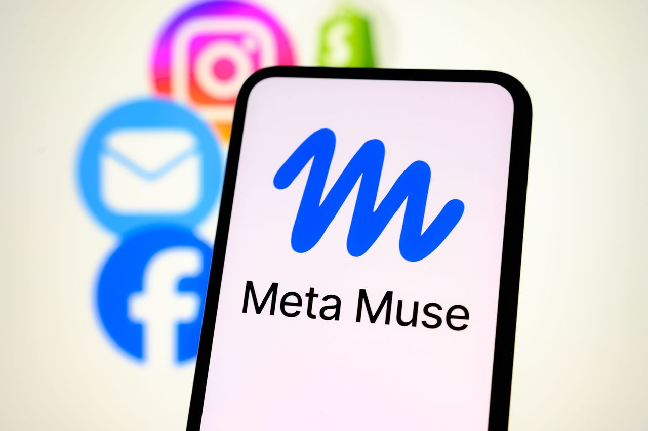 The Muse logo is displayed on a smartphone screen with a promotional visual for Muse in the background. (Photo by Samuel Boivin/NurPhoto via Getty Images)