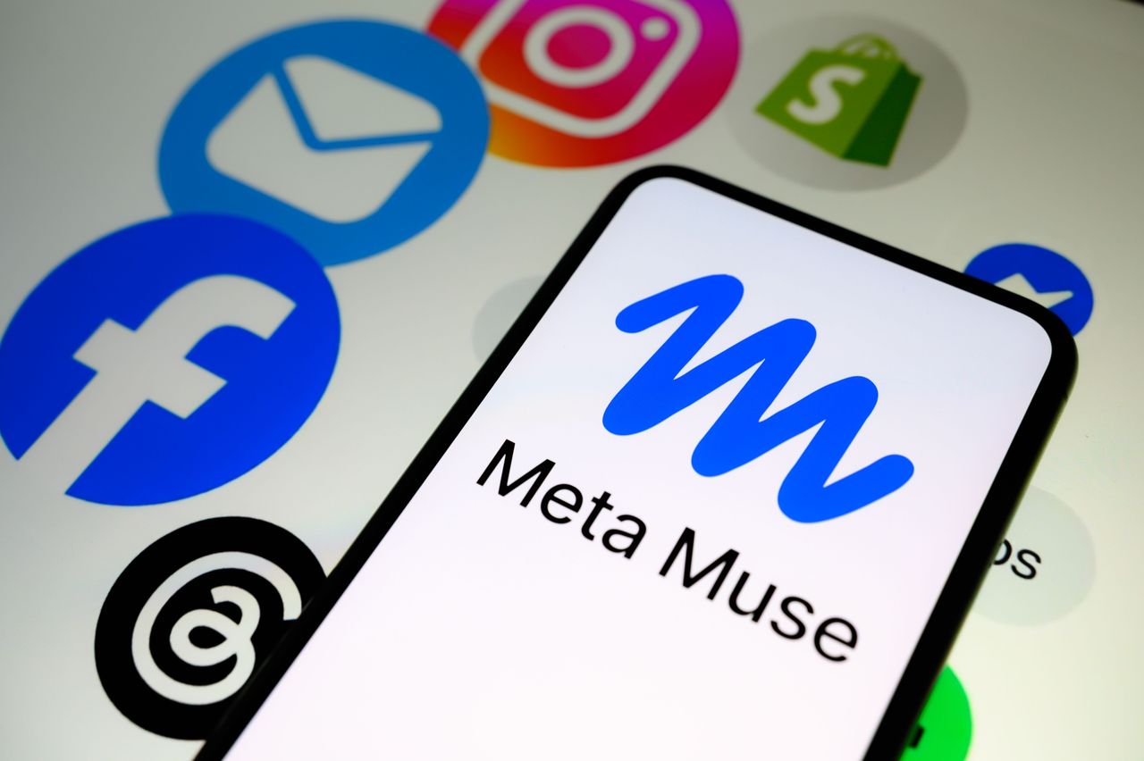 The Muse logo is displayed on a smartphone screen with a promotional visual for Muse in the background. (Photo by Samuel Boivin/NurPhoto via Getty Images)