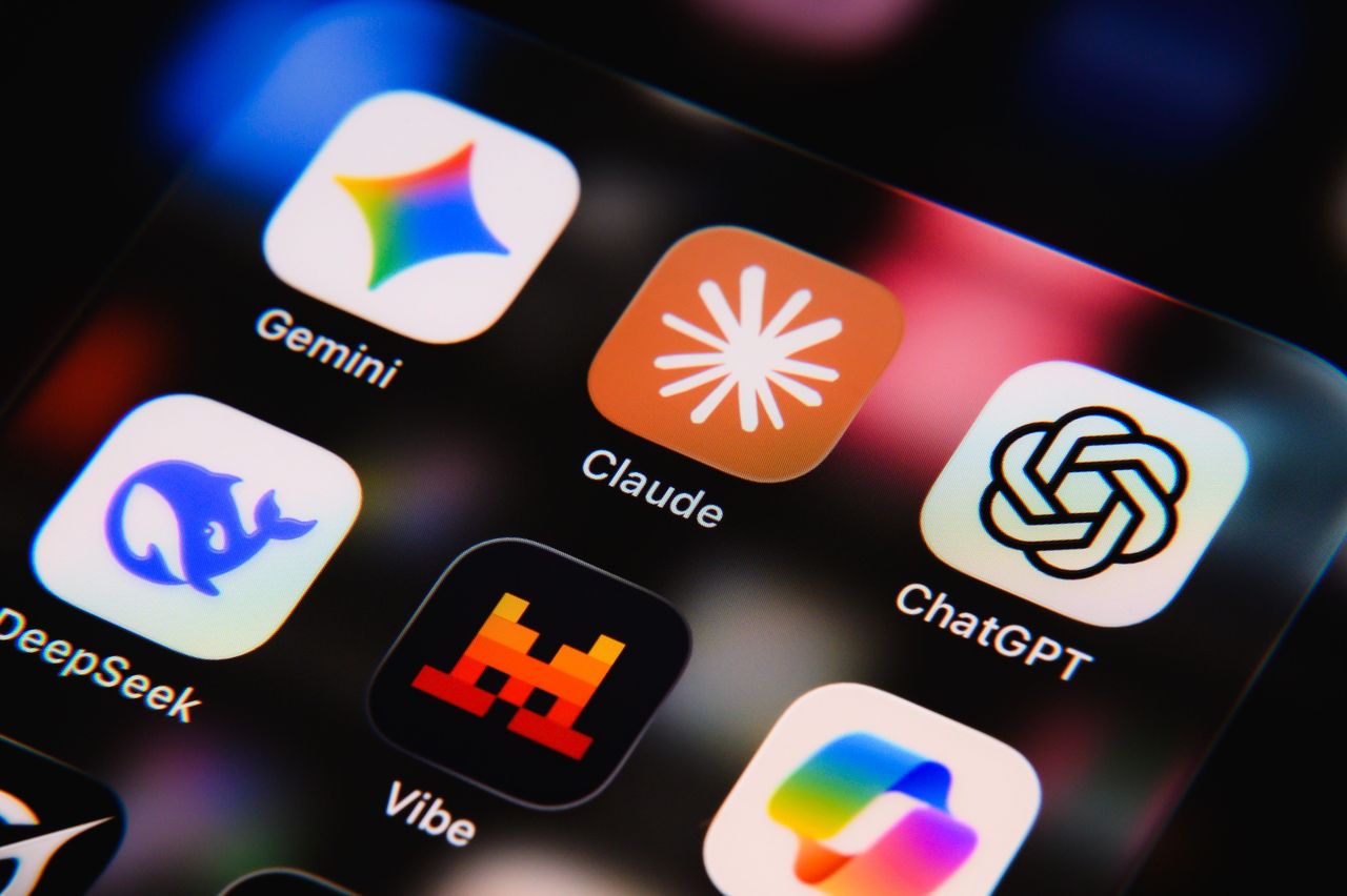 A close-up shows the Gemini, Claude, ChatGPT, DeepSeek, Mistral and Copilot icons on a smartphone screen. (Photo by Samuel Boivin/NurPhoto via Getty Images)