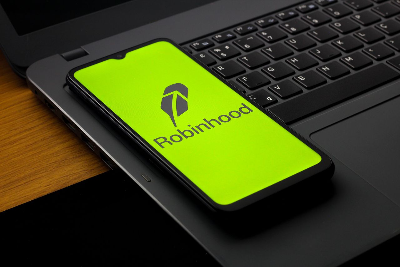 In this photo illustration, the Robinhood Markets logo is seen displayed on a smartphone screen. (Photo Illustration by Thomas Fuller/SOPA Images/LightRocket via Getty Images)