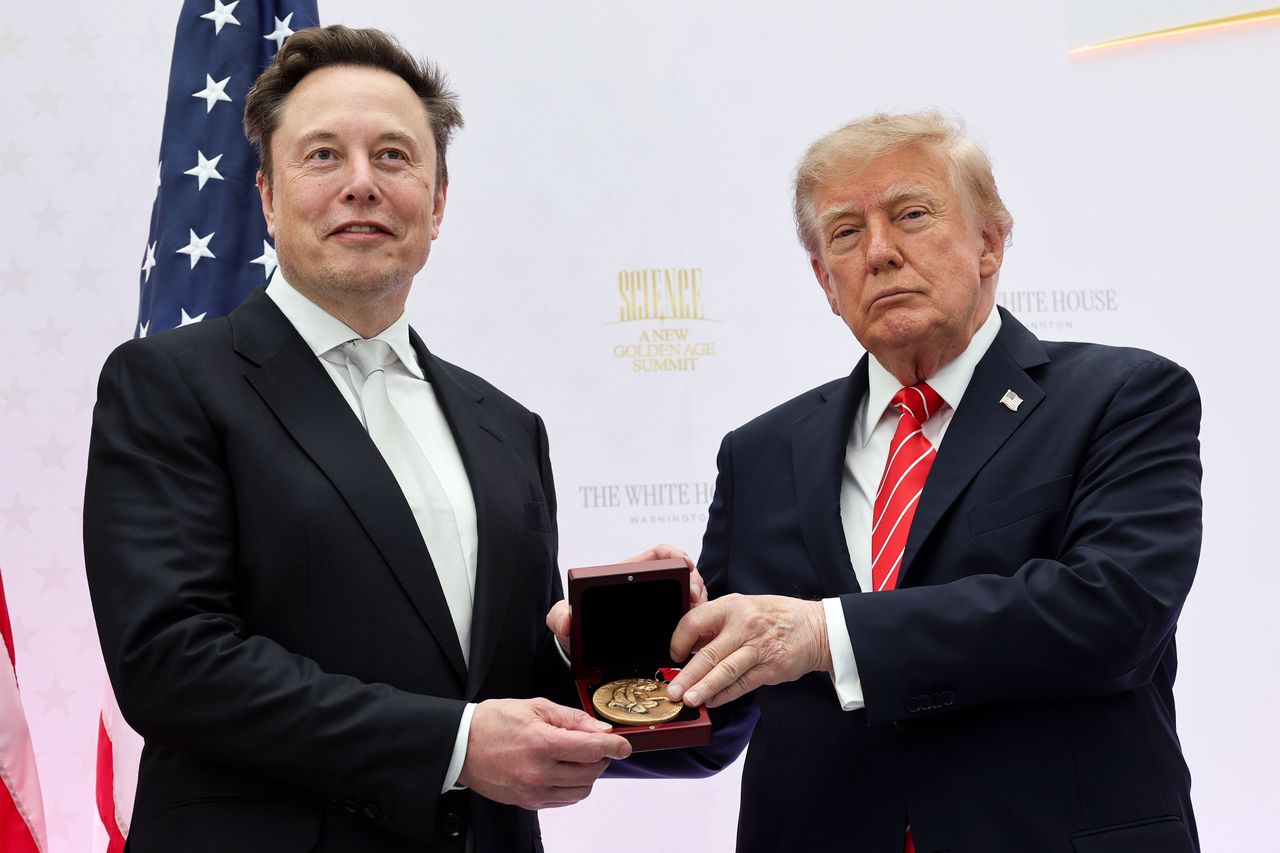 Tesla and SpaceX CEO Elon Musk (L) receives the National Medal of Science from U.S. President Donald Trump during the Golden Age of American Innovation Summit at the Institute of Peace on October 08, 2026