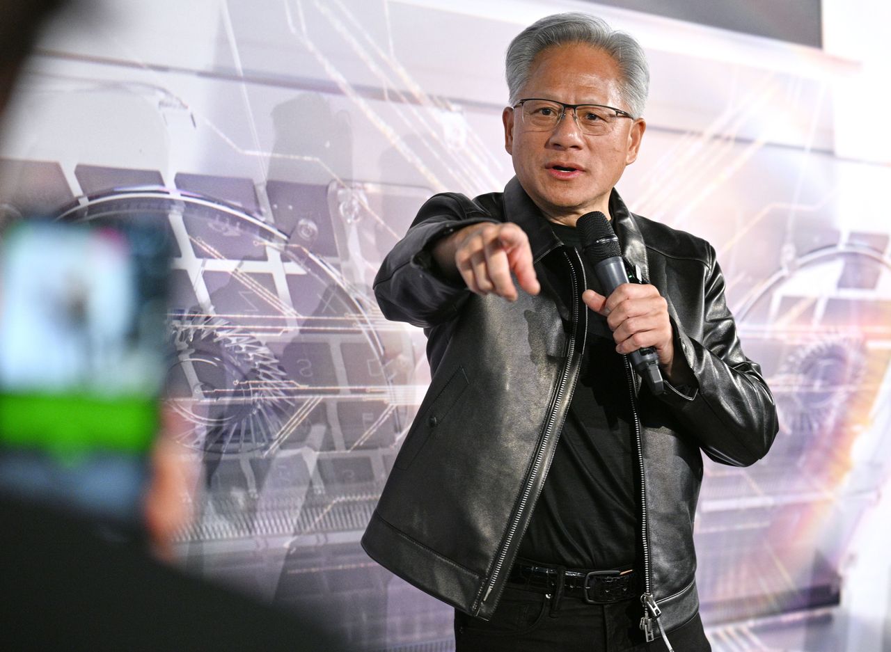 Nvidia CEO Jensen Huang addresses guests at Xperion on Alexanderplatz during the launch of a new RTX Spark laptop. A new chip from the U.S. chipmaker has been developed to run AI models. (Photo by Jens Kalaene/picture alliance via Getty Images)