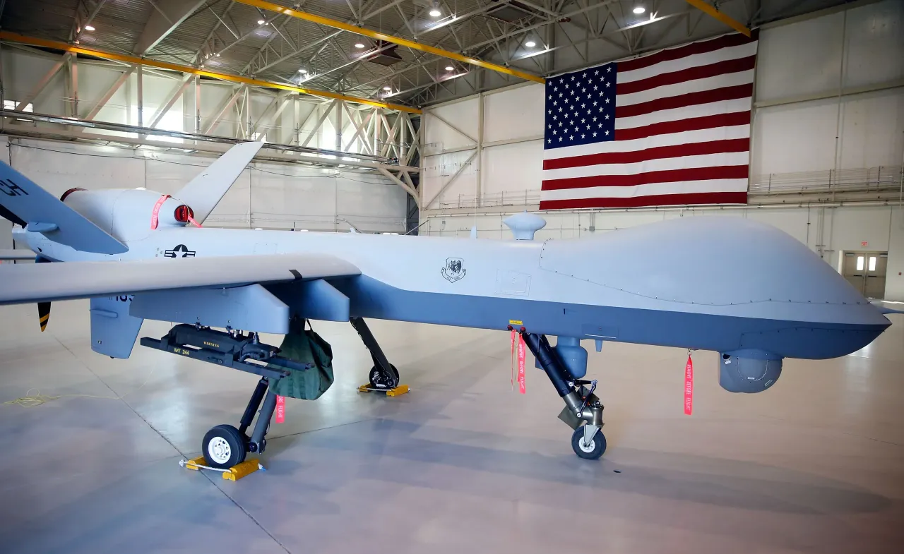 An MQ-9 Reaper remotely piloted aircraft (RPA) is parked in a hanger at Creech Air Force Base.