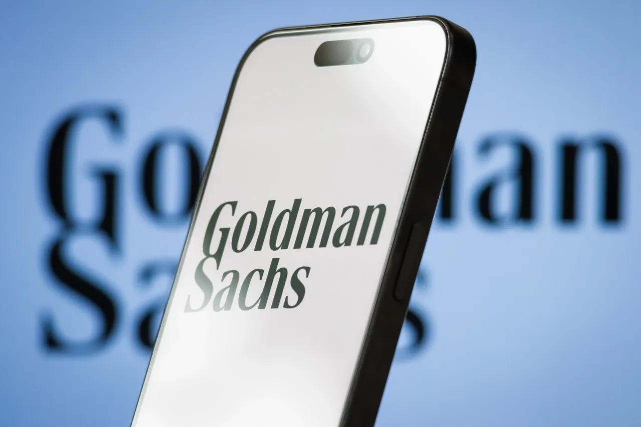  In this photo illustration, the Goldman Sachs logo is displayed on a smartphone screen.