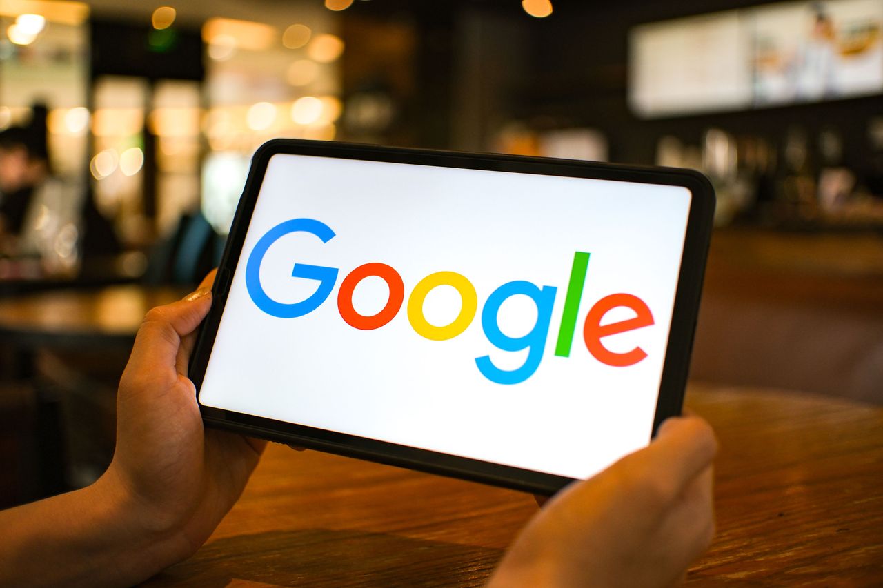The Google logo is seen displayed on a tablet screen. (Photo Illustration by Sheldon Cooper/SOPA Images/LightRocket via Getty Images)