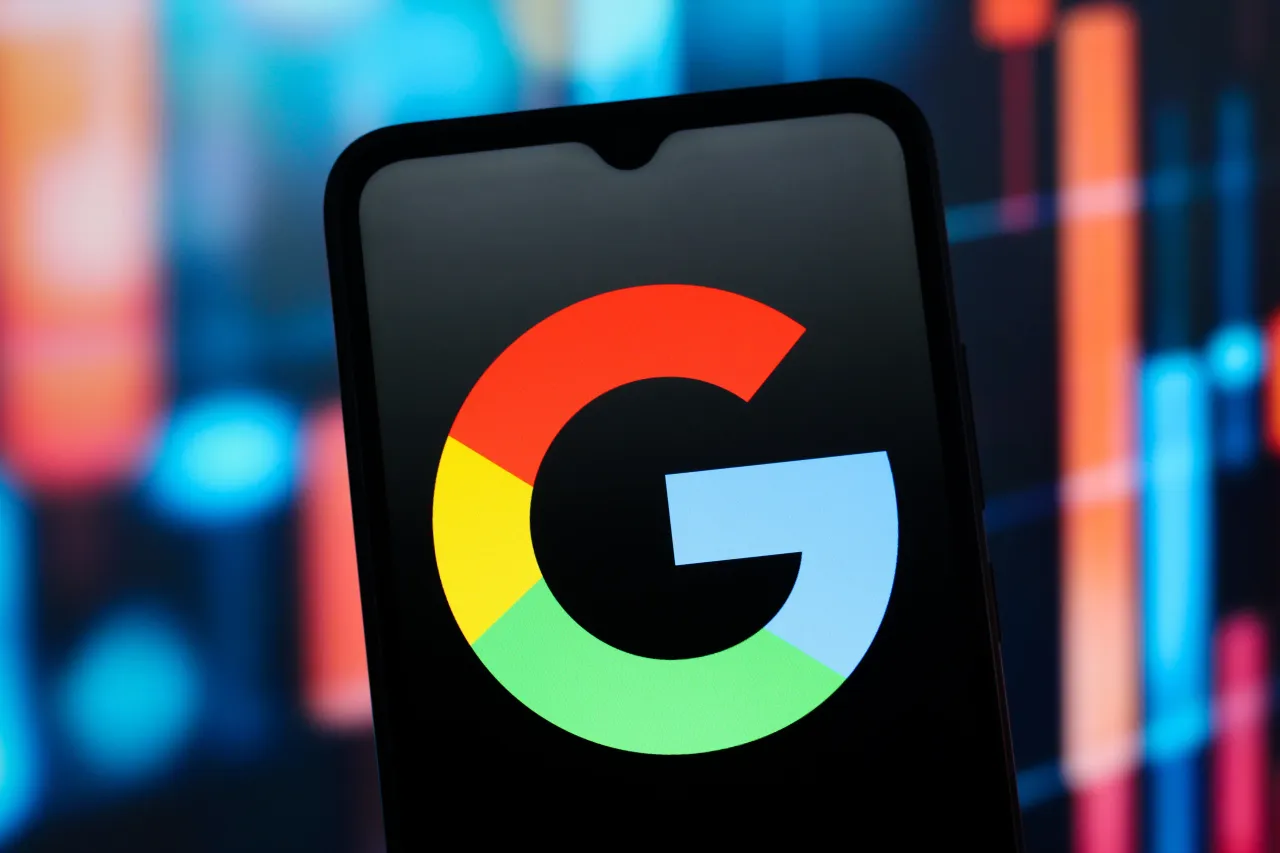 In this photo illustration, the Google logo is seen displayed on a smartphone screen. 