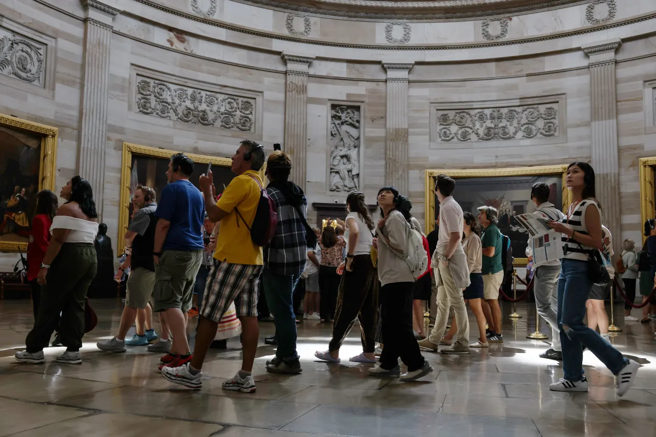 Tourists walk through the Rotunda in the U.S. Capitol Building on September 23, 2025 in Washington, DC. 
