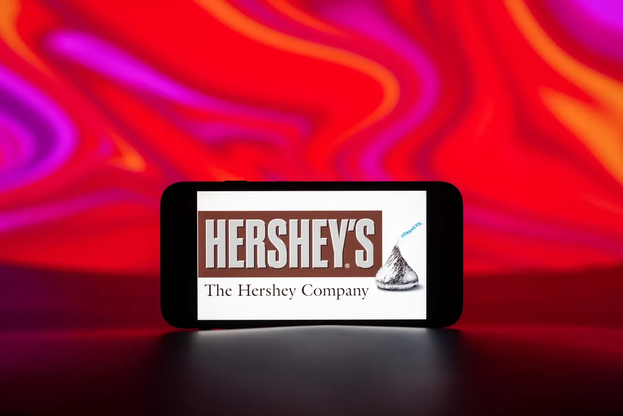 In this photo illustration, the Hershey logo is seen displayed on a mobile phone screen.