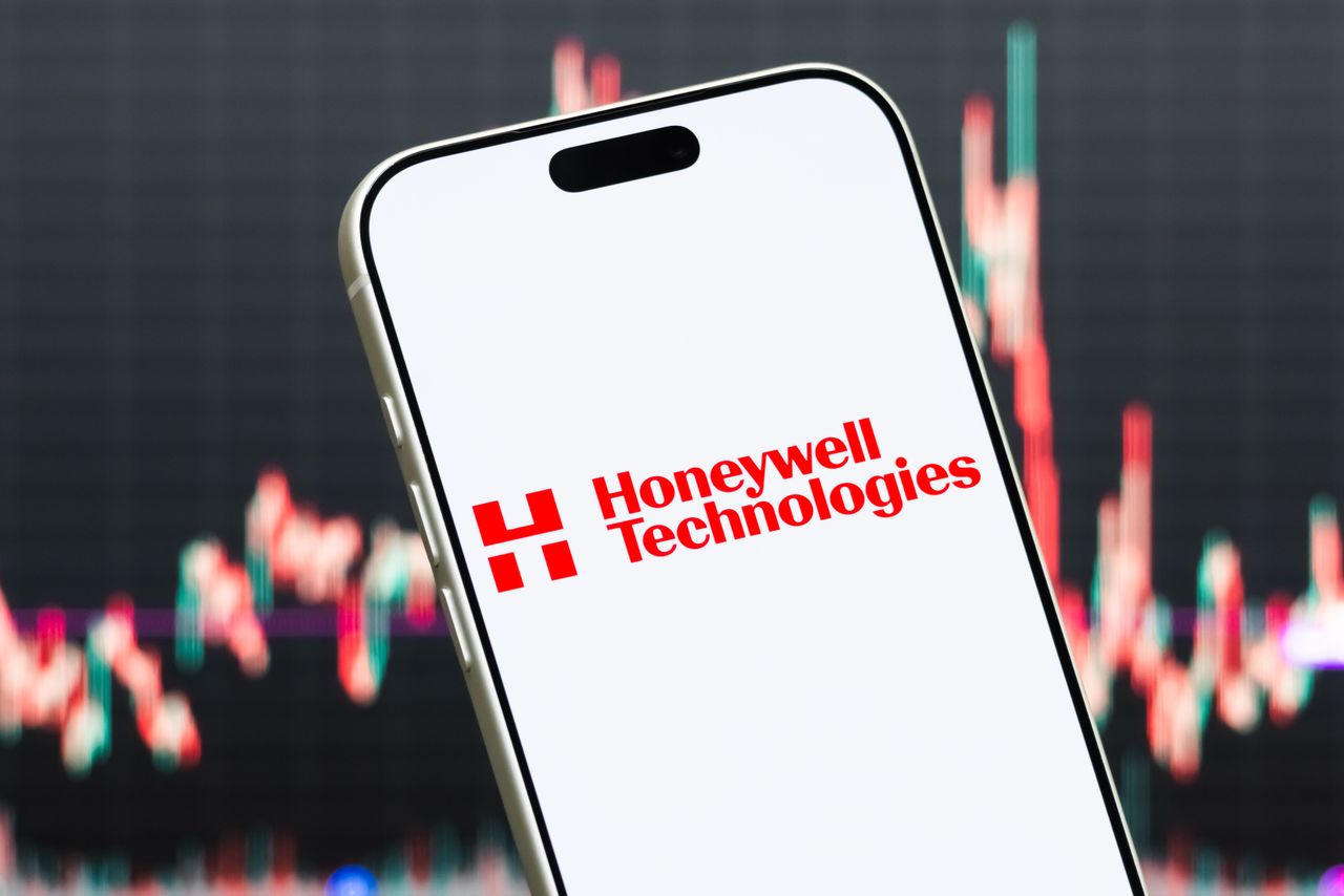 A smartphone displays the logo of Honeywell Technologies. (Photo illustration by Cheng Xin/Getty Images)