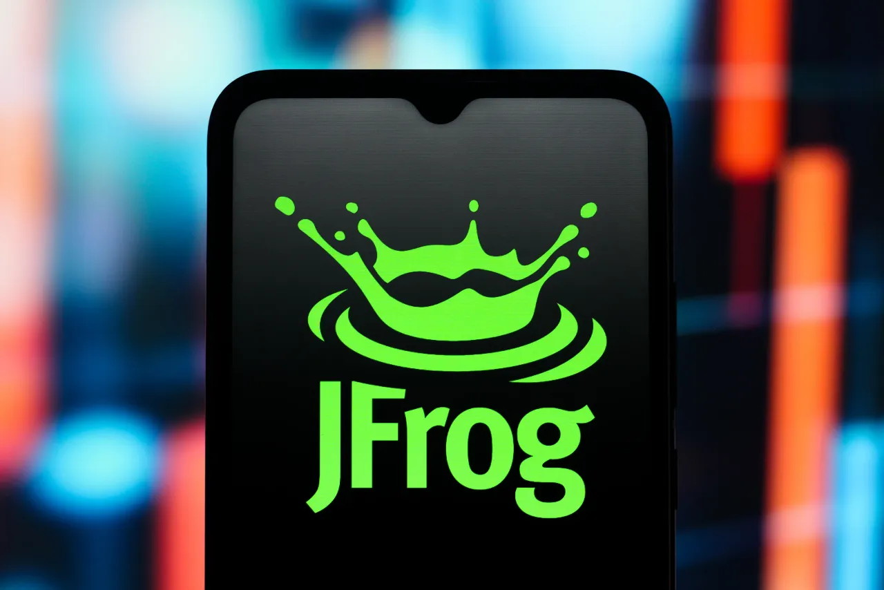 In this photo illustration, the JFrog (J Frog) logo is seen displayed on a smartphone screen. 