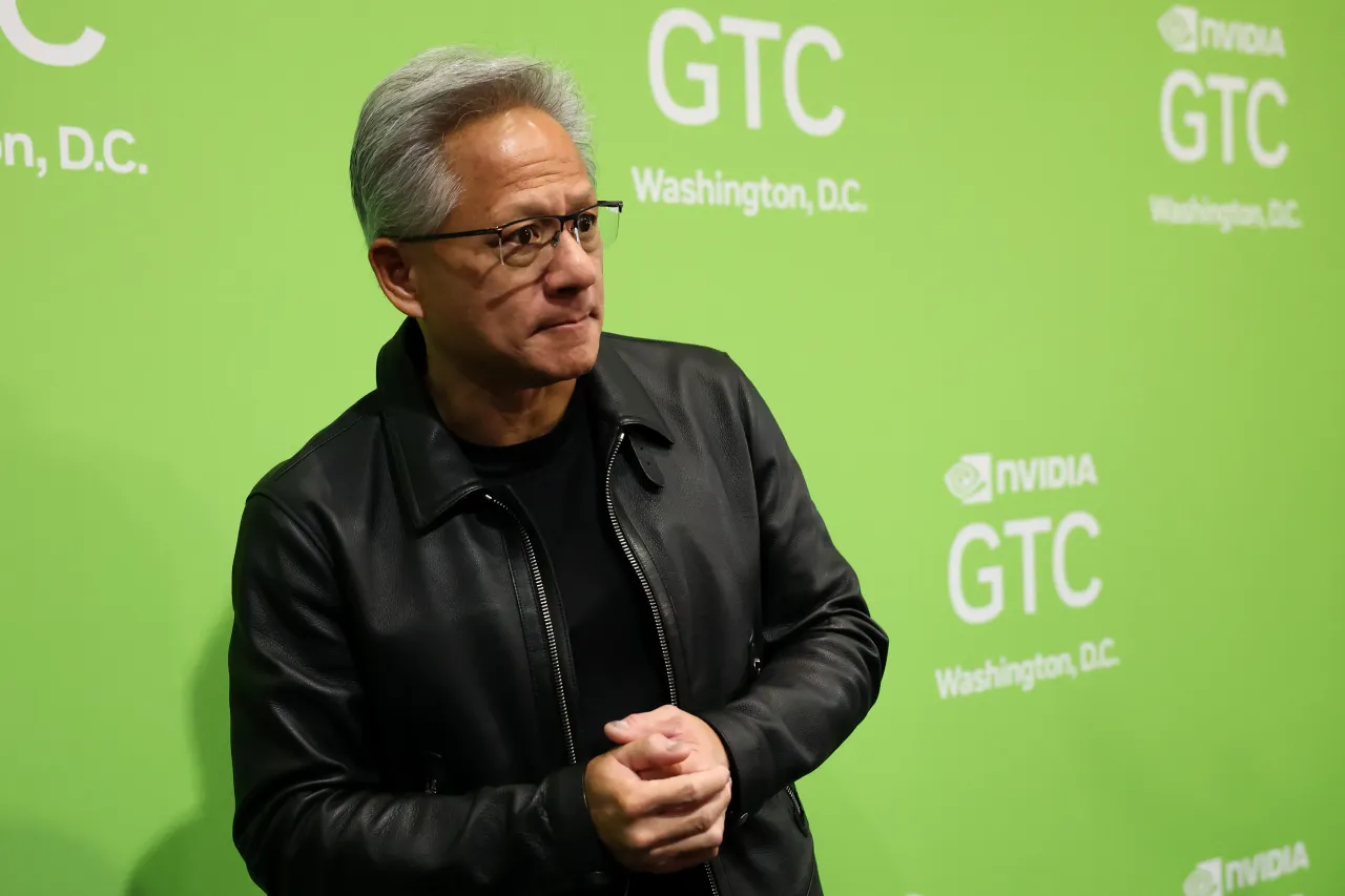 Nvidia President and CEO Jensen Huang speaks to the media during the Nvidia GTC (GPU Technology Conference) at the Walter E. Washington Convention Center on October 28, 2025.