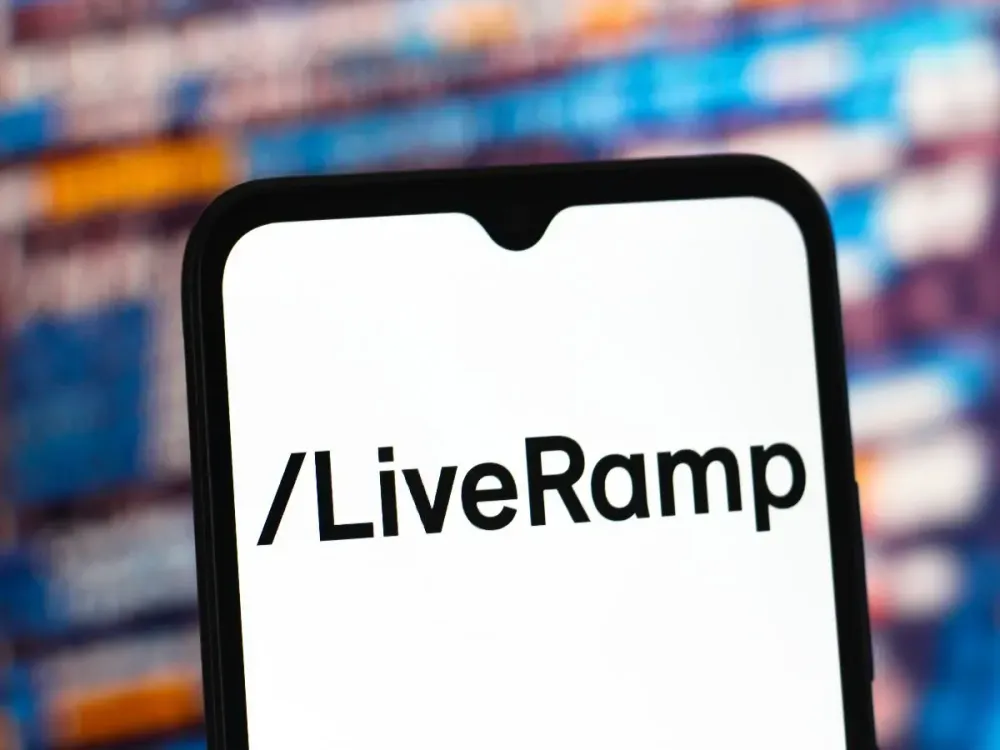 LiveRamp Holdings logo is seen displayed on a smartphone screen. 