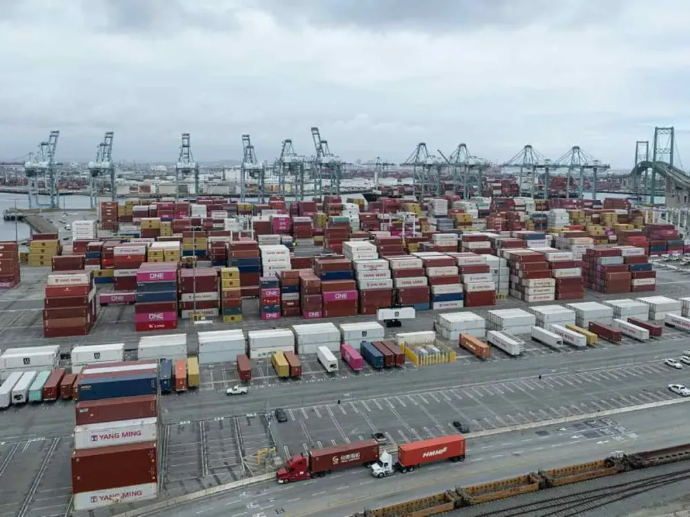 Aerial view of shipping containers stacked at a port on May 5, 2025 in Los Angeles, California. 