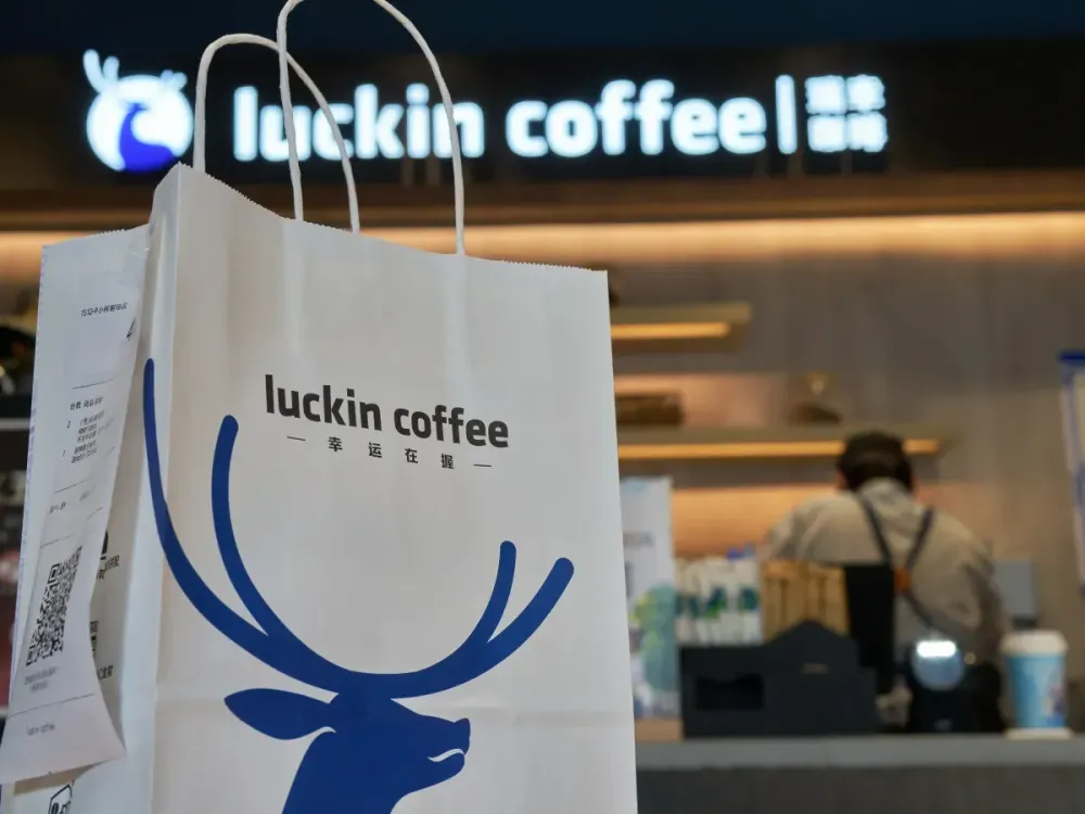 A take-out paper bag in a Luckin Coffee store. (Photo by Zhang Peng/LightRocket via Getty Images)