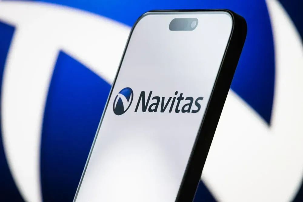 In this photo illustration, the logo of Navitas Semiconductor Corp is displayed on a smartphone screen, with the company's blue branding visible in the background, on May 04, 2025, in Chongqing, China. 