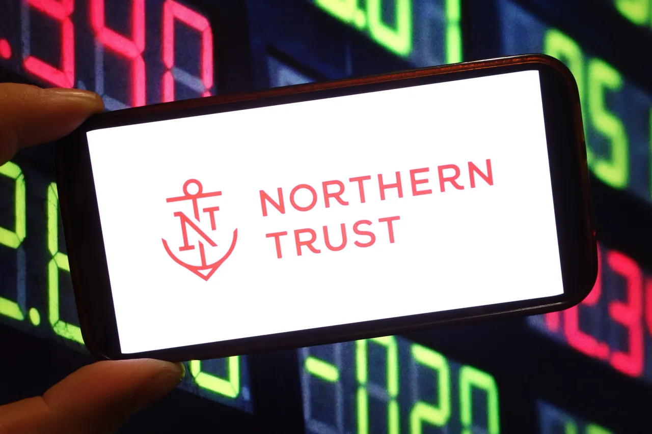 In this photo illustration, the Northern Trust company logo is seen displayed on a smartphone screen. (Photo Illustration by Piotr Swat/SOPA Images/LightRocket via Getty Images)