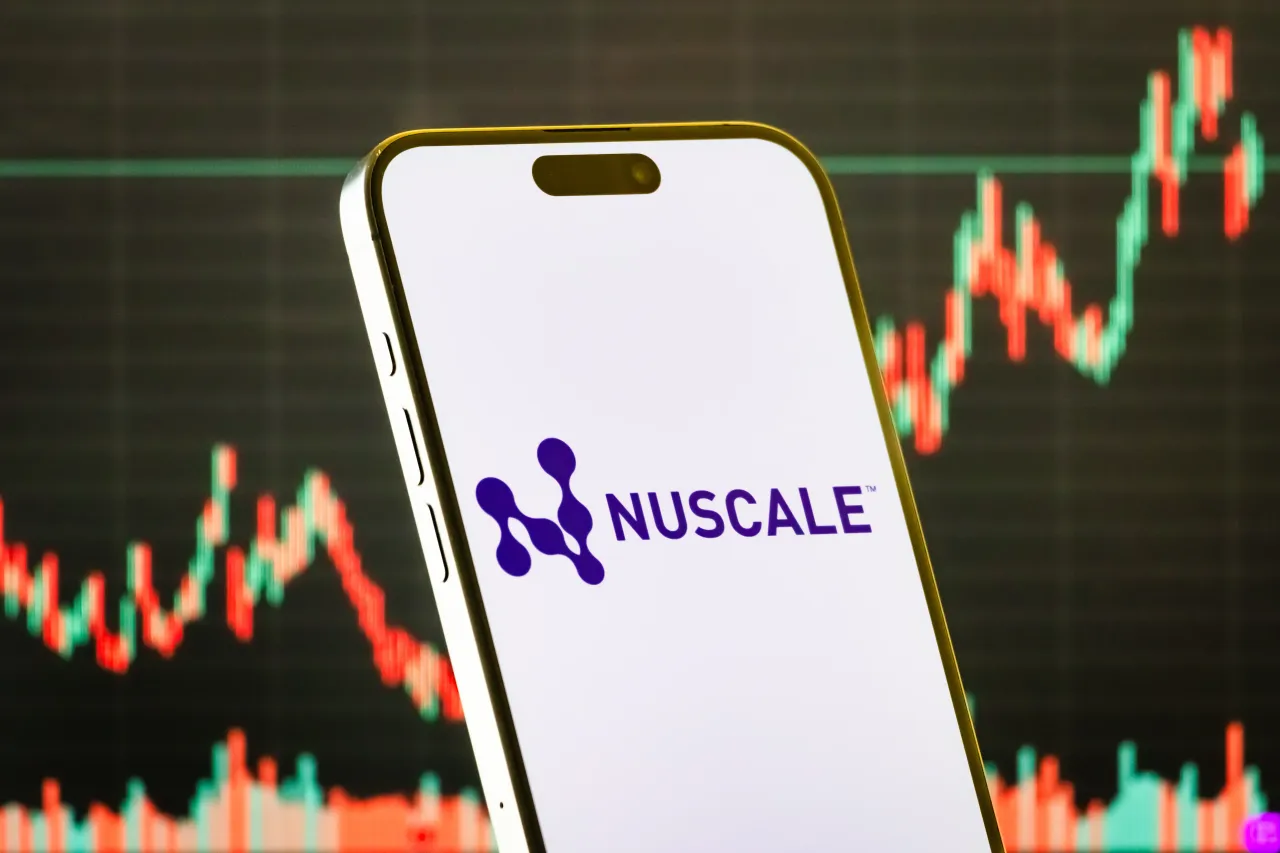 In this photo illustration, a smartphone displays the logo of NuScale Power Corporation (NYSE: SMR), an American company developing small modular nuclear reactor (SMR) technology.