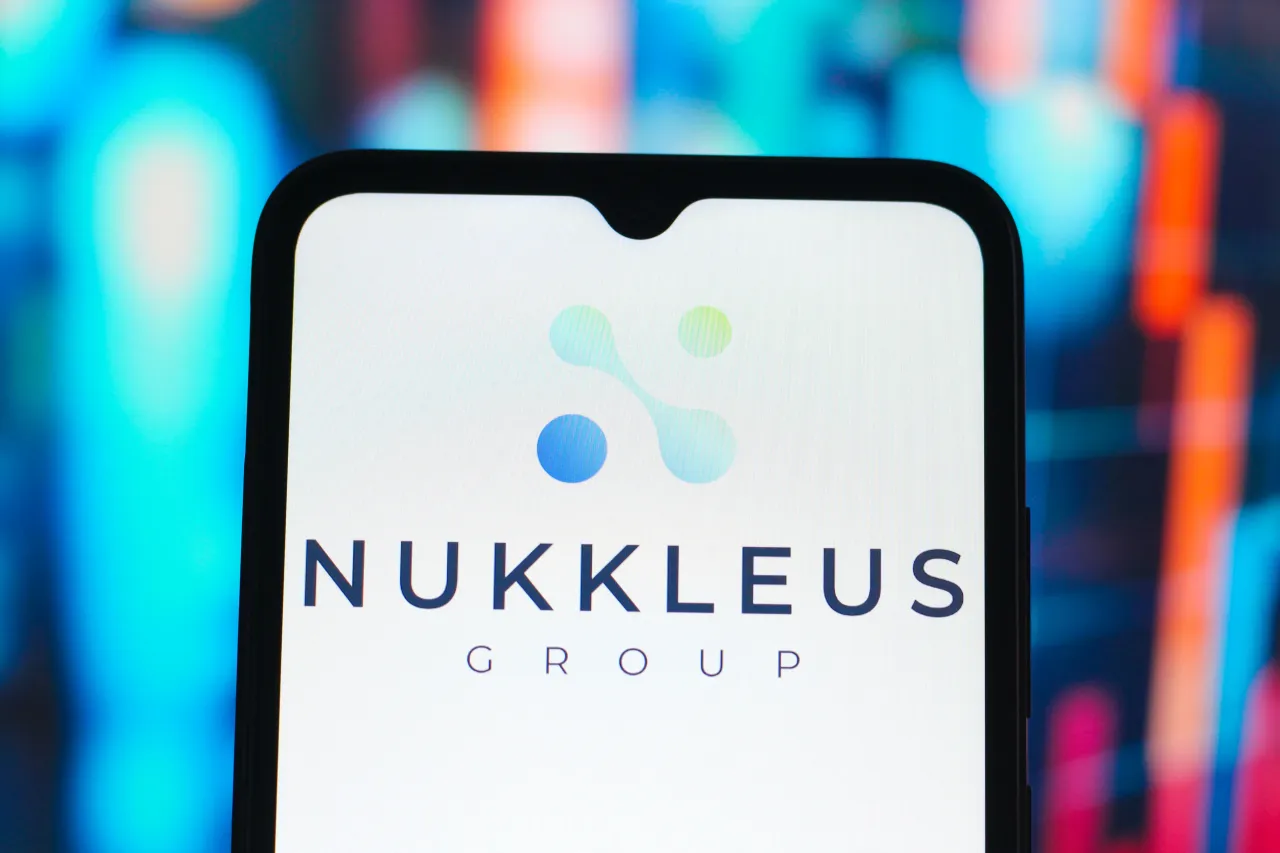 In this photo illustration, the Nukkleus logo is seen displayed on a smartphone screen.