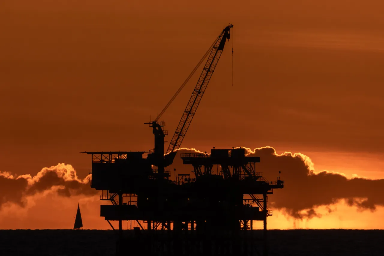 An offshore oil platform is seen at sunset on February 9, 2024 near Huntington Beach, California.