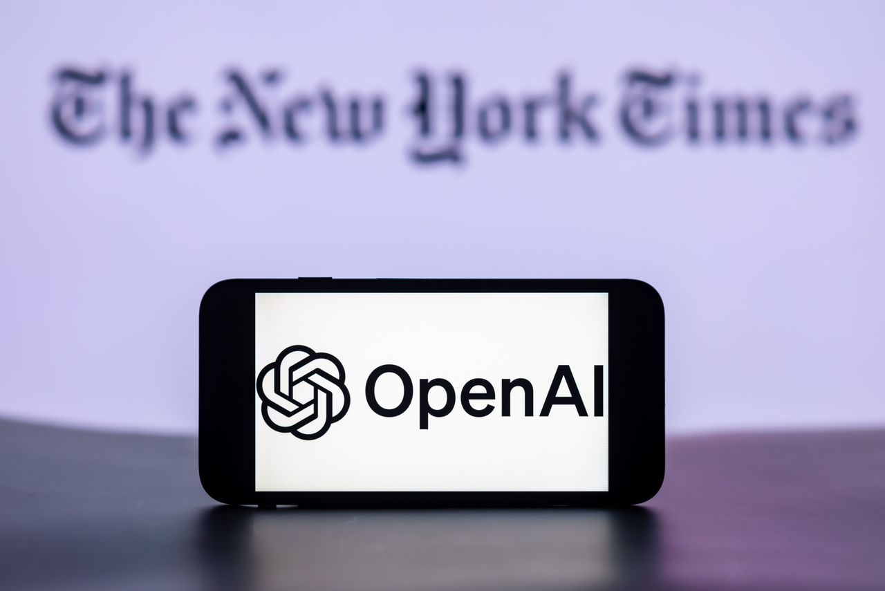 In this photo illustration, the OpenAI logo is seen displayed on a mobile phone screen with the New York Times Logo in the background. (Photo Illustration by Idrees Abbas/SOPA Images/LightRocket via Getty Images)