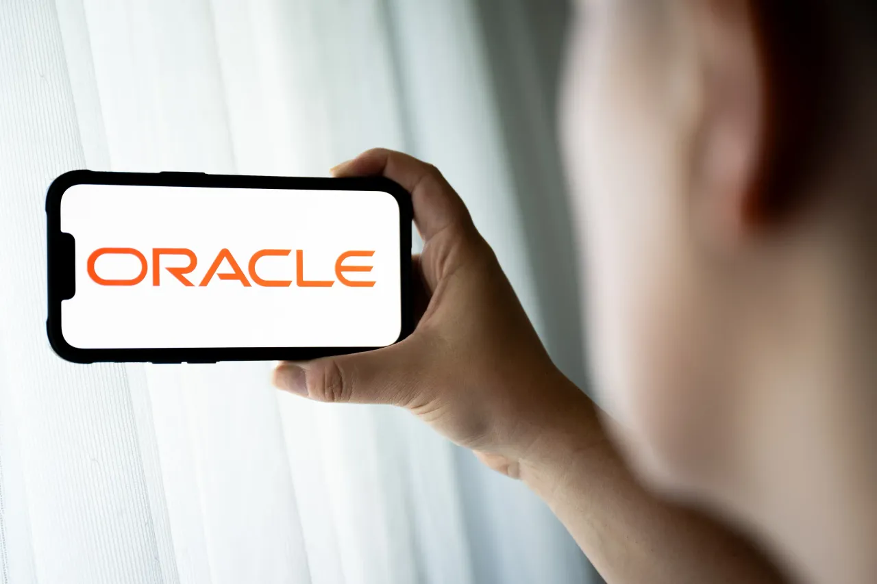 In this photo illustration, a Oracle logo is seen displayed on a smartphone. 