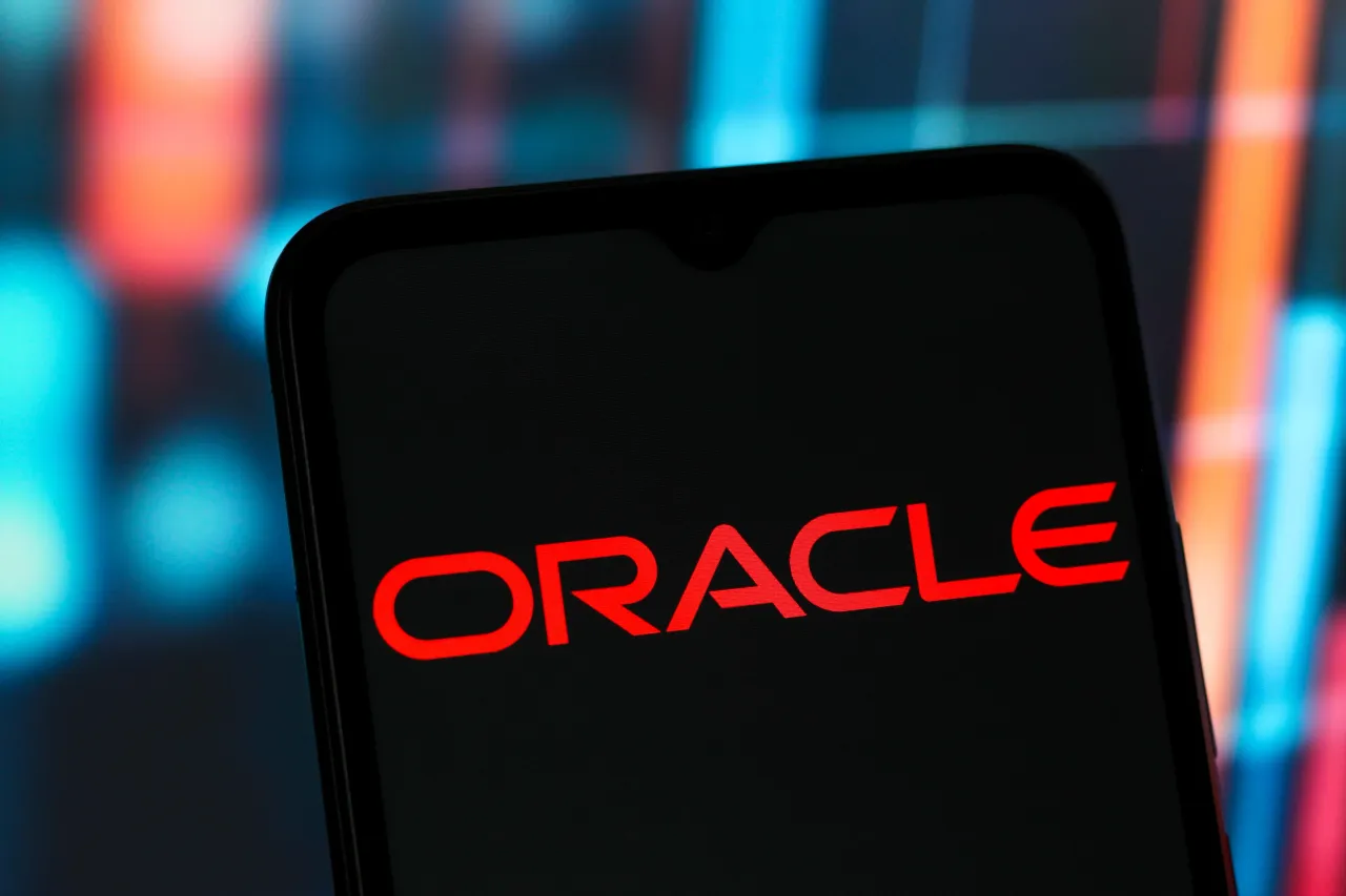 In this photo illustration, the Oracle Corporation logo is seen displayed on a smartphone screen.