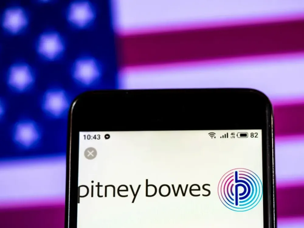 In this photo illustration, the Pitney Bowes Company logo seen displayed on a smartphone. (Photo Illustration by Igor Golovniov/SOPA Images/LightRocket via Getty Images)