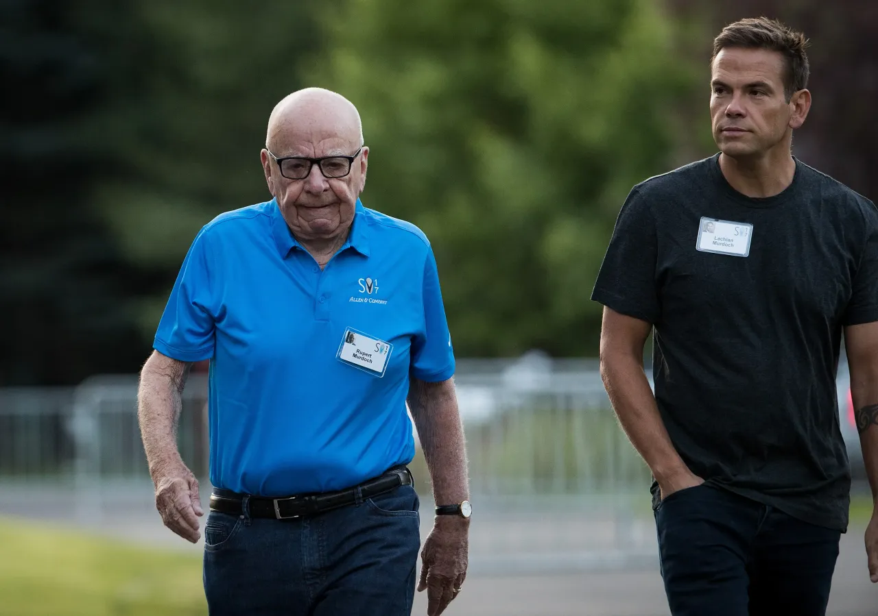 Media mogul Rupert Murdoch and his son Lachlan Murdoch walk together as they arrive on the third day of the annual Allen & Company Sun Valley Conference, July 13, 2017 in Sun Valley, Idaho.