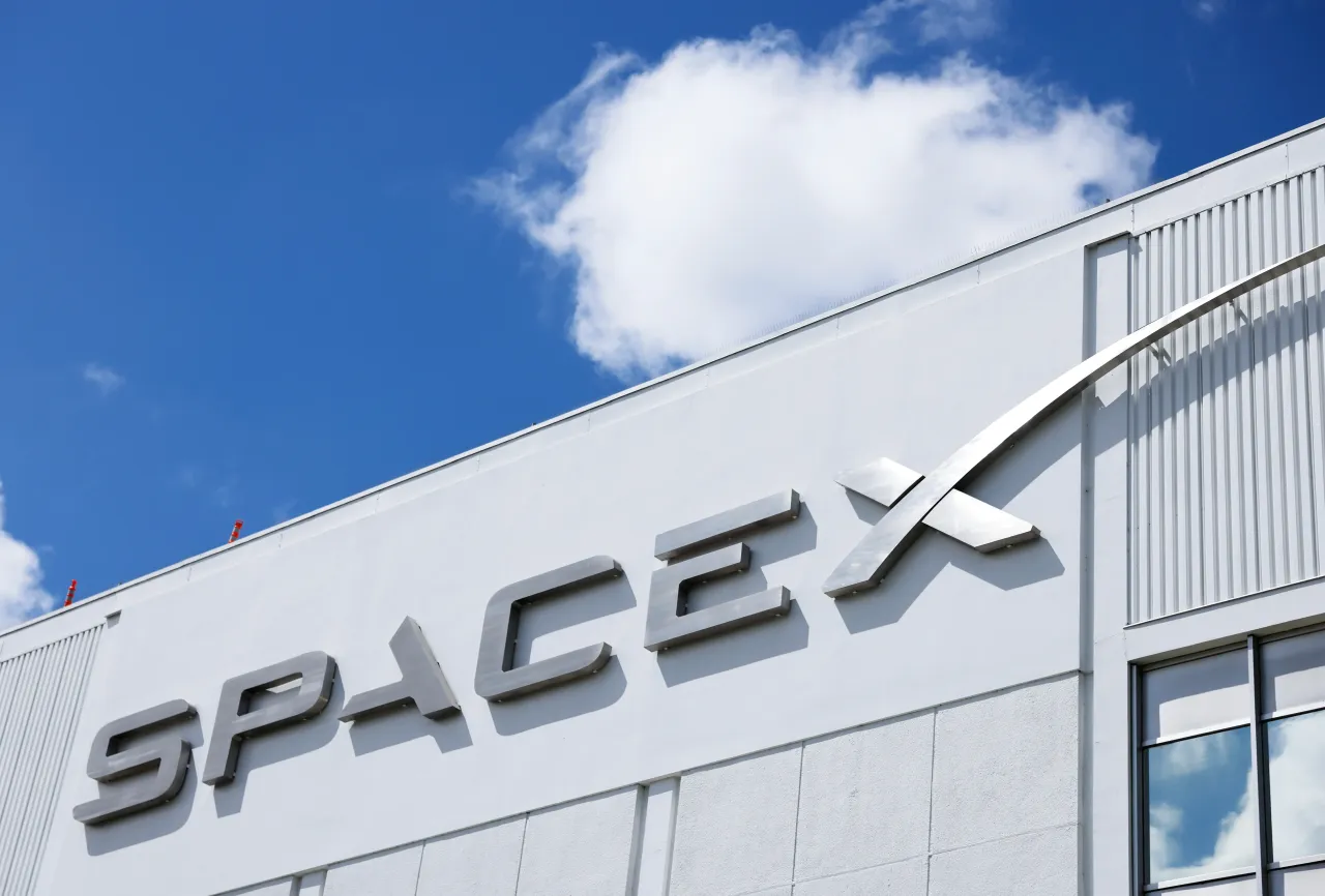 SpaceX logo displayed at a SpaceX facility in Hawthorne, California. (Photo by Mario Tama/Getty Images)