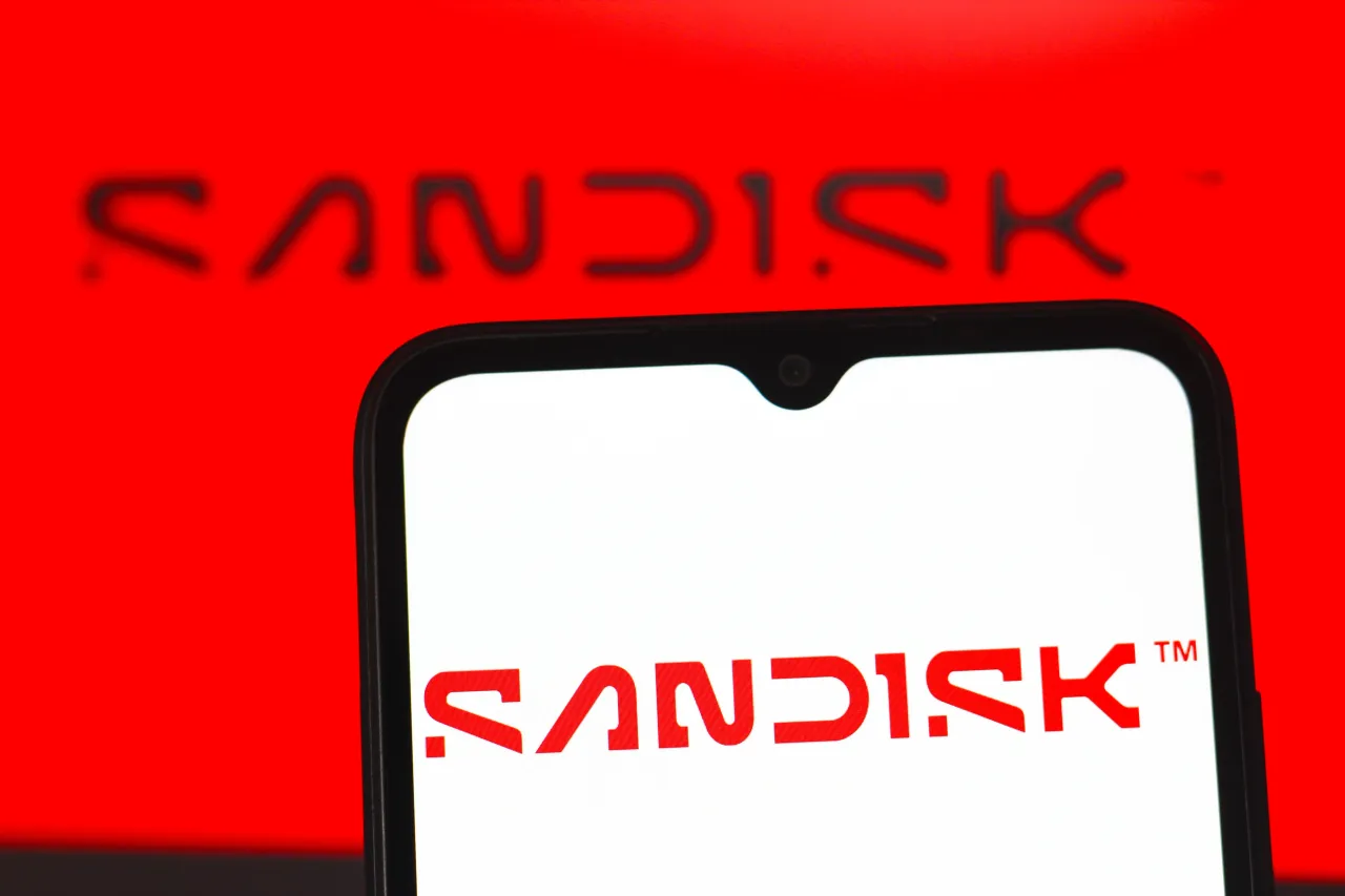In this photo illustration, the SanDisk Corporation logo is displayed on a smartphone screen. 