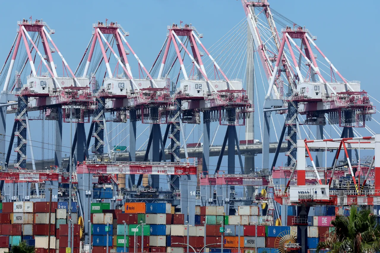 A view of shipping underway and trucks moving goods on the Long Beach International Gateway Bridge at the Port of Long Beach in Long Beach Friday, Aug. 1, 2025. 