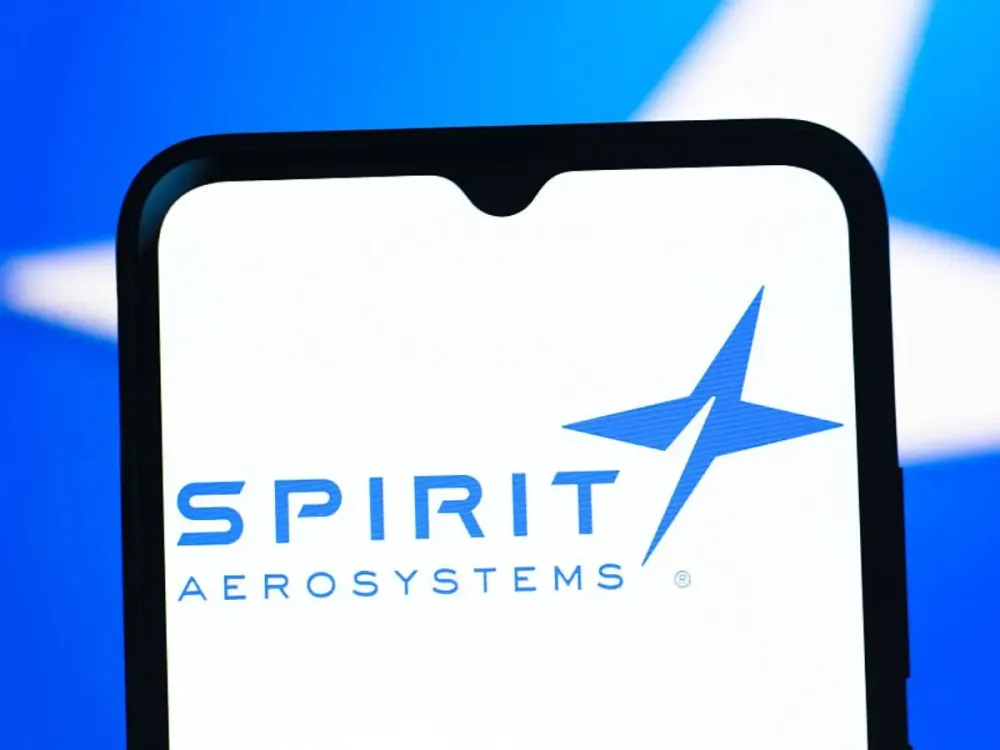 In this photo illustration, the Spirit Aerosystems Holdings logo is seen displayed on a smartphone screen. (Photo Illustration by Thomas Fuller/SOPA Images/LightRocket via Getty Images)