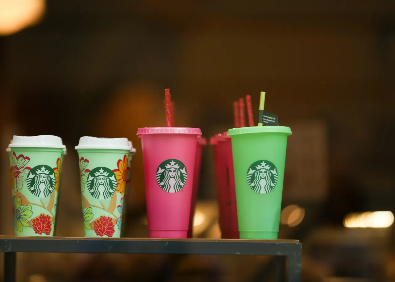 Bottles with the Starbucks logo are seen on the street in Krakow, Poland, on June 18, 2025.