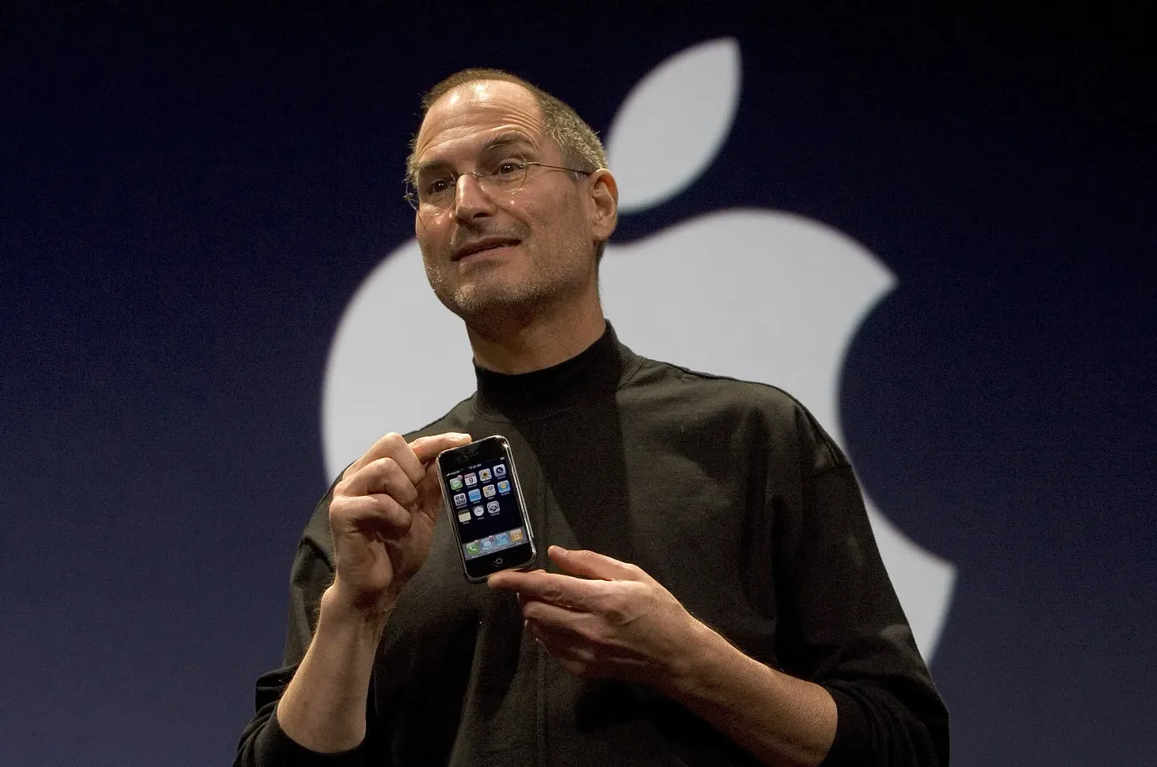 Late Apple CEO Steve Jobs holds up the new iPhone introduced at Macworld on January 9, 2007 in San Francisco, California