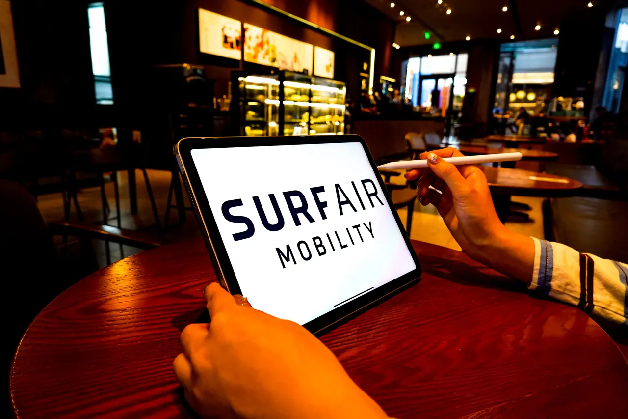 In this photo illustration, the Surf Air Mobility logo is displayed on the screen of an iPad. 
