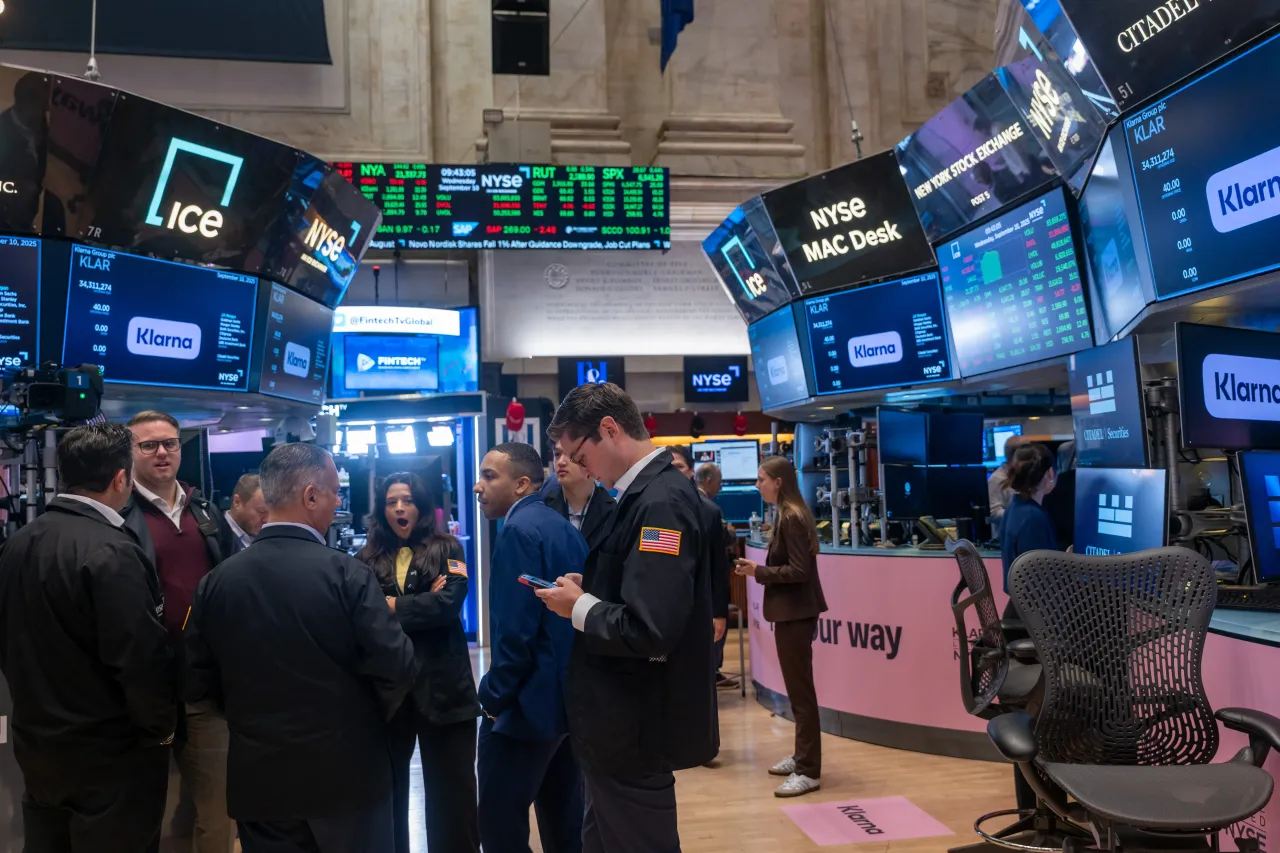 Traders on the floor prepare for the initial public offering (IPO) of the online lender Klarna at the New York Stock Exchange (NYSE) on September 10, 2025, in New York City. 