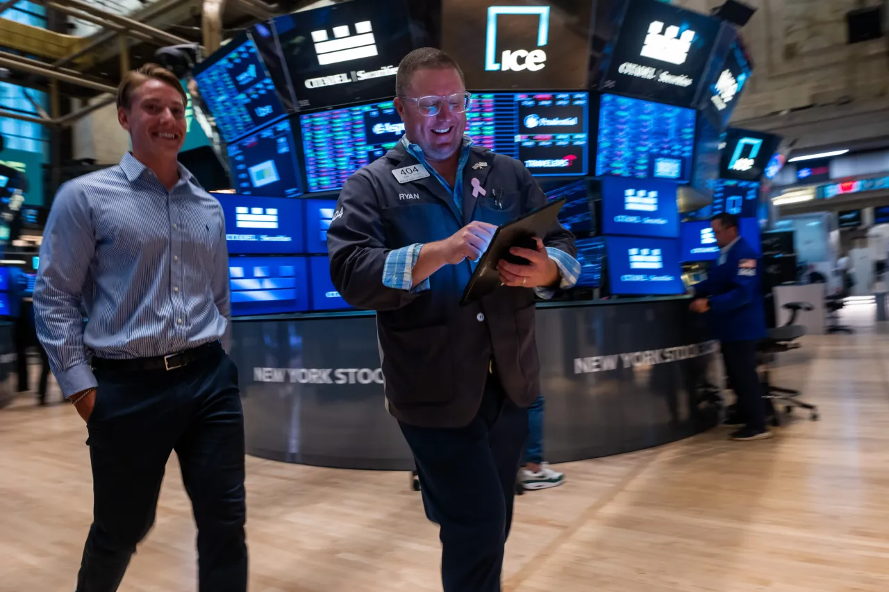 Traders work on the floor of the New York Stock Exchange (NYSE) on July 07, 2025, in New York City. 