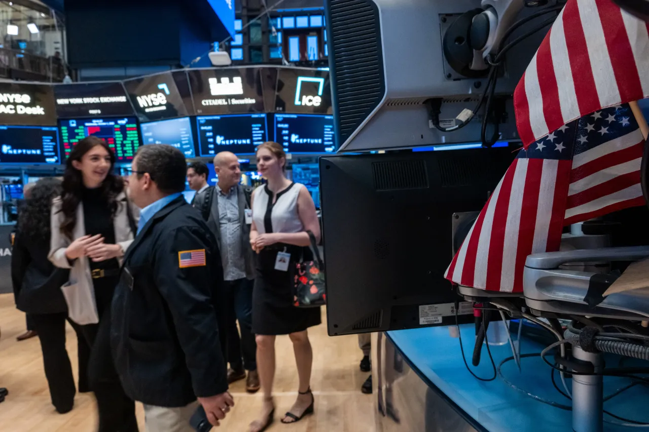 Traders work on the floor of the New York Stock Exchange (NYSE) on October 01, 2025, in New York City. 