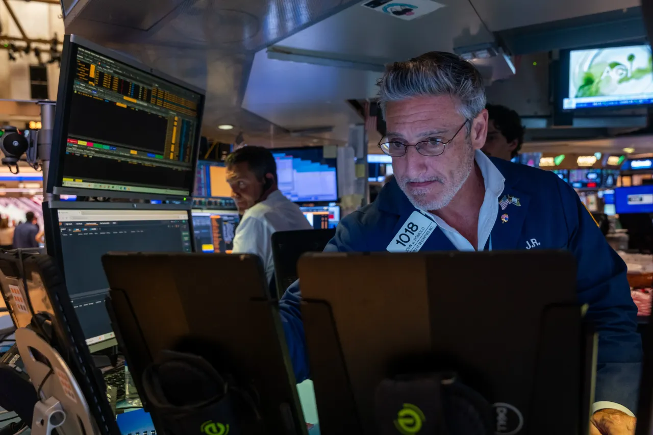 Traders work on the floor of the New York Stock Exchange (NYSE) on July 11, 2025 in New York City. As new tariffs continue to concern investors, the Dow fell over 250 points in trading Friday. 