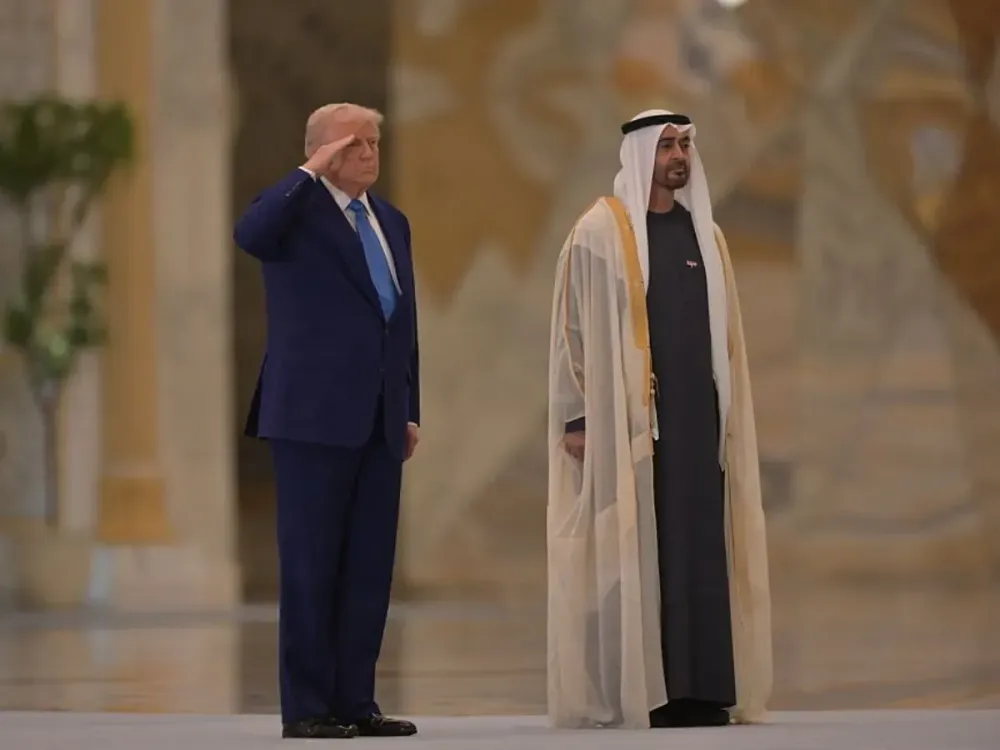 U.S. President Donald Trump (L) is welcomed with an official ceremony by UAE President Mohammed bin Zayed Al Nahyan (R) on May 15. (Photo by Waleed Zein/Anadolu via Getty Images)