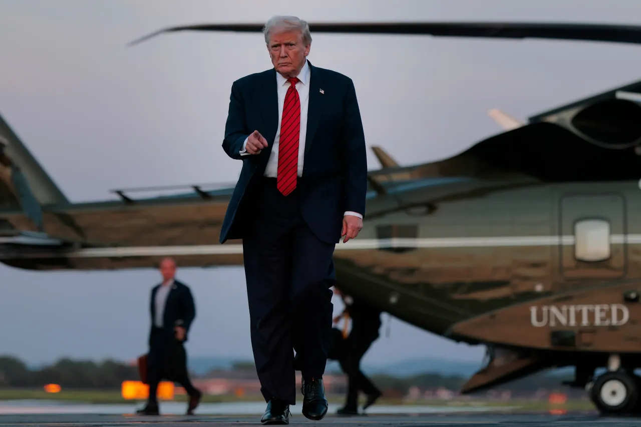 U.S. President Donald Trump walks towards reporters from Marine One at the Lehigh Valley International Airport on August 03, 2025, in Allentown, Pennsylvania. 