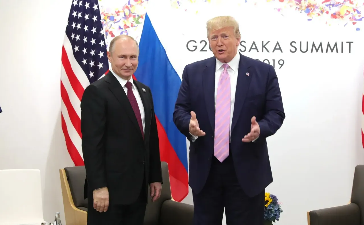 President Donald Trump (R) meets Russian President Vladimir Putin (L) on the first day of the G20 summit in Osaka, Japan on June 28, 2019.
