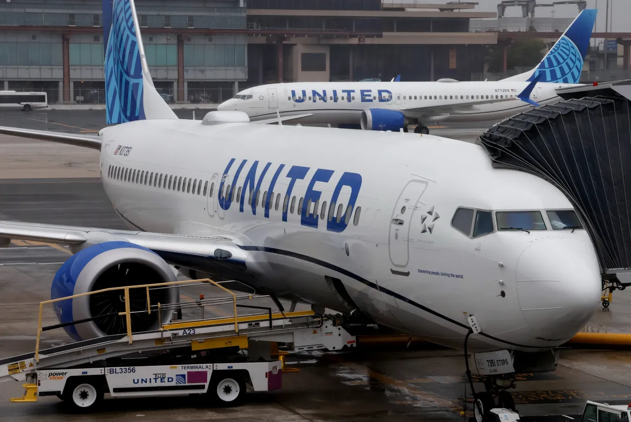 A United Airlines airplane is serviced at a gate at Newark Liberty International Airport on September 28, 2024, in Newark, New Jersey. 
