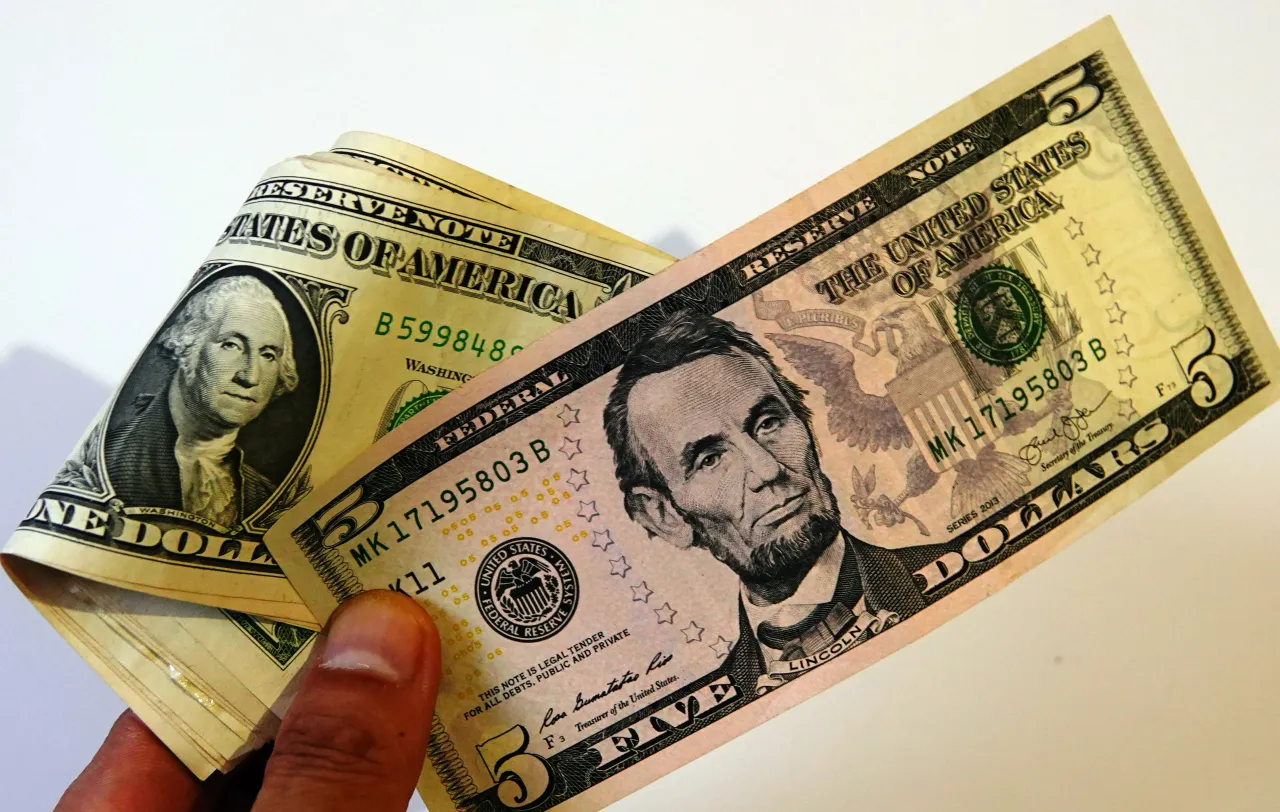 US dollar banknotes, Yichang City, Hubei Province, China on August 10, 2025. 