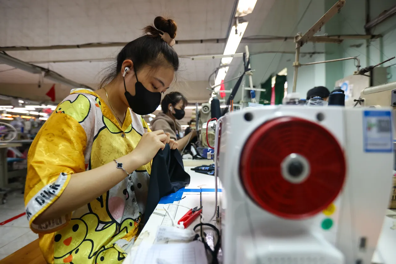 Female workers at a Thai Son S.P. Co. garment factory endeavor to produce products for global clients, in Thu Duc, Ho Chi Minh, Vietnam, on June 21, 2025.