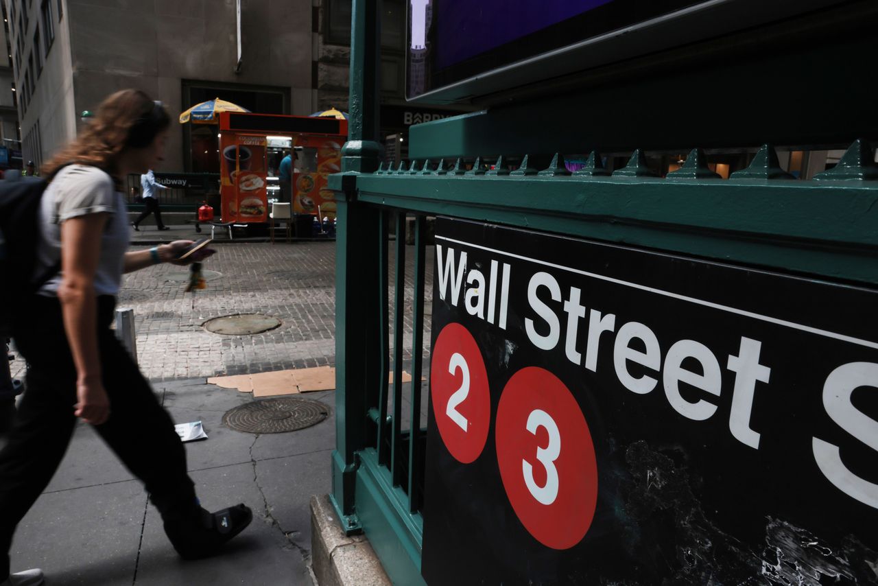 People walk outside the New York Stock Exchange (NYSE) on September 09, 2026, in New York City. (Photo by Spencer Platt/Getty Images)