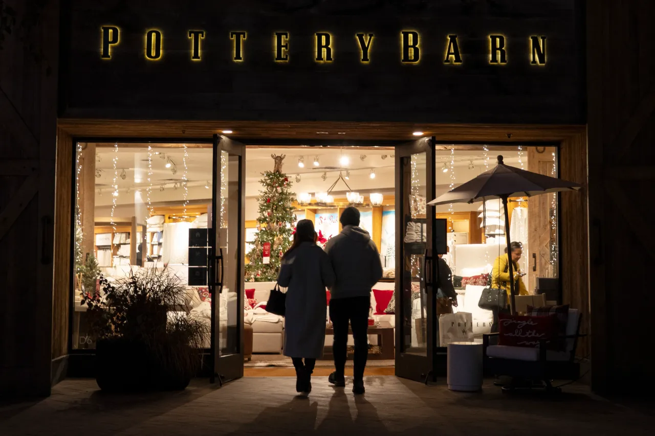 Shoppers walk into a Pottery Barn store at the Westfield UTC shopping center on December 5, 2024 in San Diego, California.